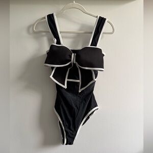 Elegant Black and White One Piece Swimsuit with Bow Accent